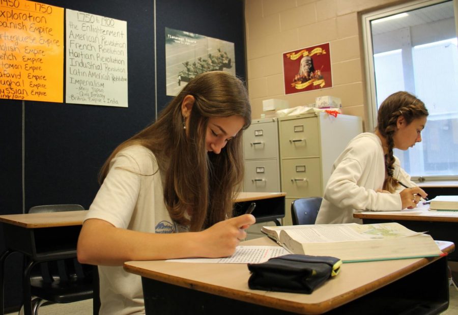 Adriana Richardson sits in Ms. Hampton’s AP World History class. Reading through the textbook, she writes down important facts about the chapter. “I was working on my outlines for chapter nine on Islam,” Richardson said. 