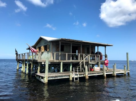 Labor Day weekend, Jake Misemer, father of AJ Misemer (‘23) walks across the deck of the family stilt house. The family arrived by boat that morning from Port Richey. Photo taken by Ms. Susan McNulty (FAC).
