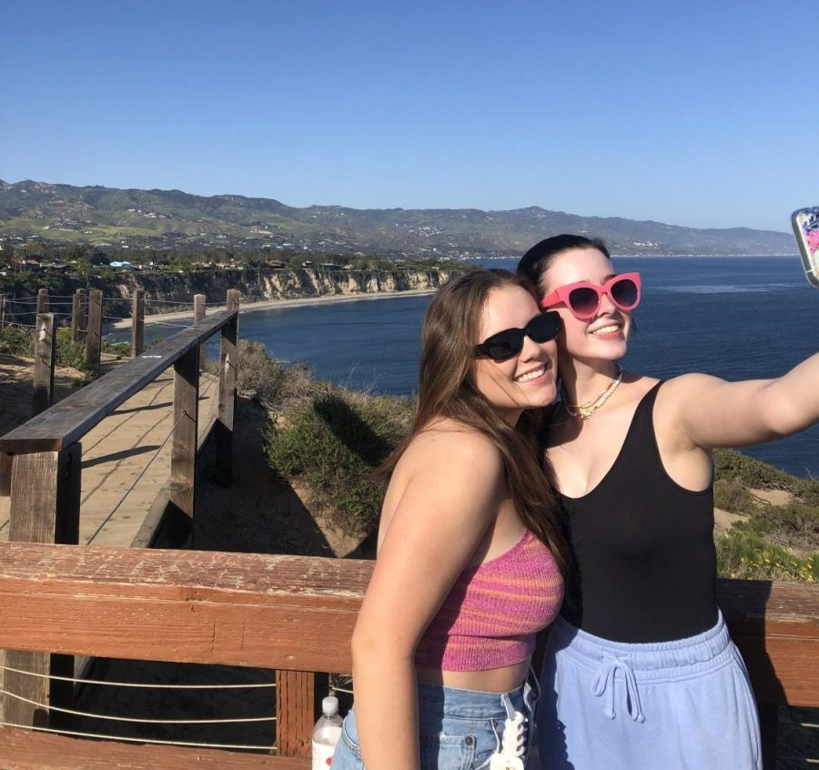 Ava+Cornett+%28%E2%80%9823%29+and+Brooke+Ealy+%28%E2%80%9823%29+capture+the+moment+with+a+selfie+on+top+of+a+cliff+in+Malibu+on+their+first+day+of+the+Los+Angeles+trip.