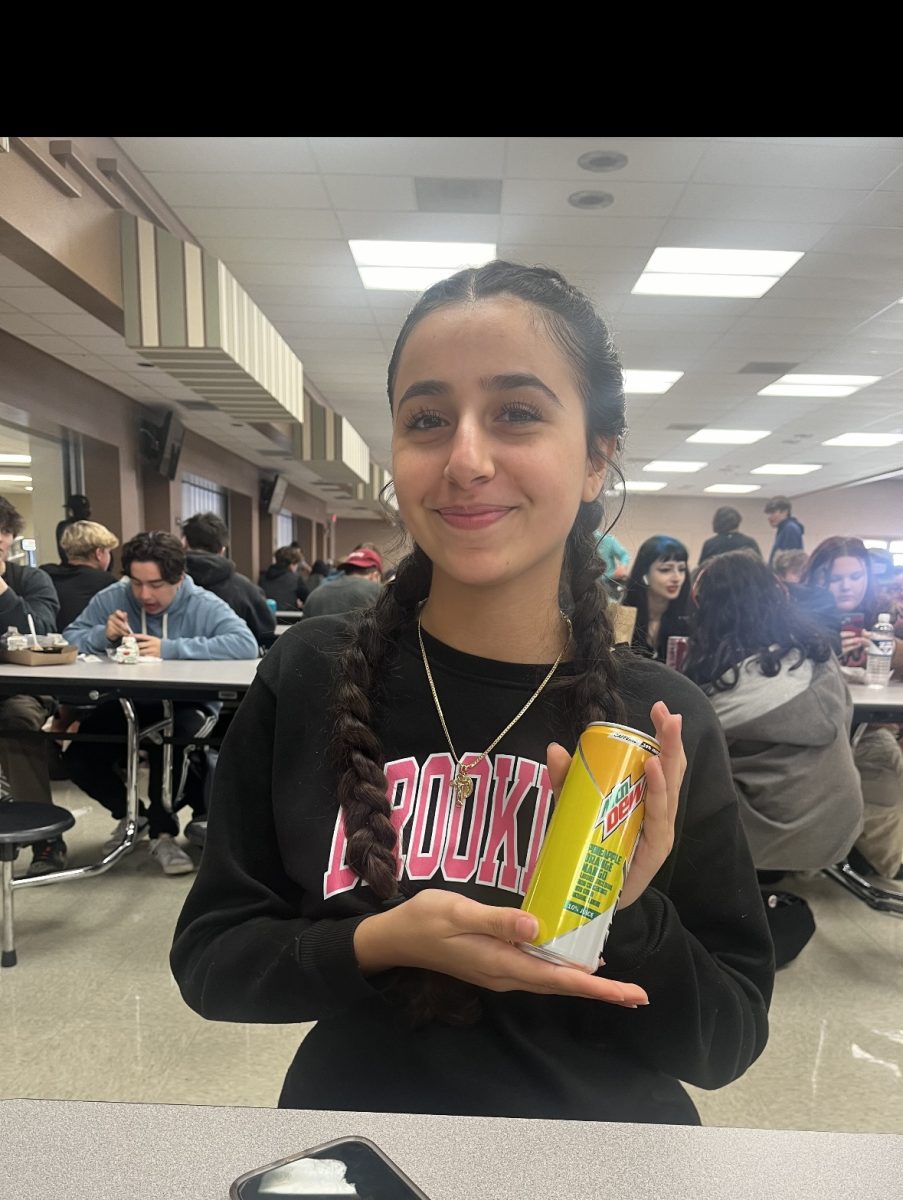 Jessica Yassa (‘25) Sips on a fruity and refreshing Mango mountain dew kickstart energy drink for today’s lunch at school.
